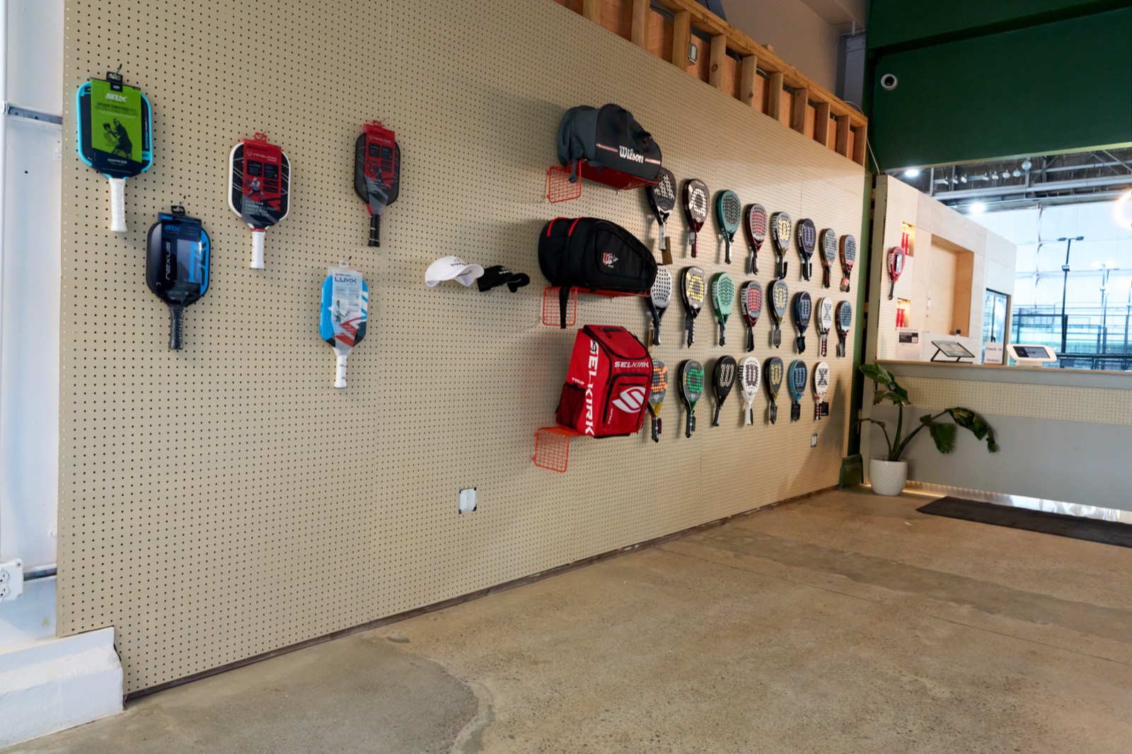 Pro shop gear wall at SF Sport Club